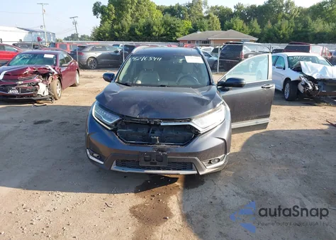 2017 Honda Cr-V Touring z USA, uszkodzony, nr VIN 7FARW1H93HE040069